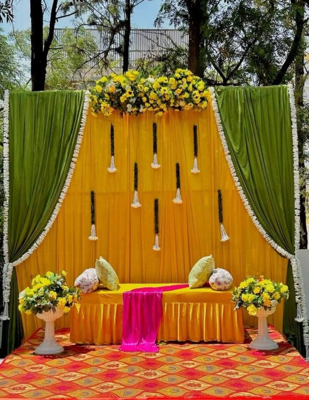 Modern minimalist mandap design in an outdoor setting